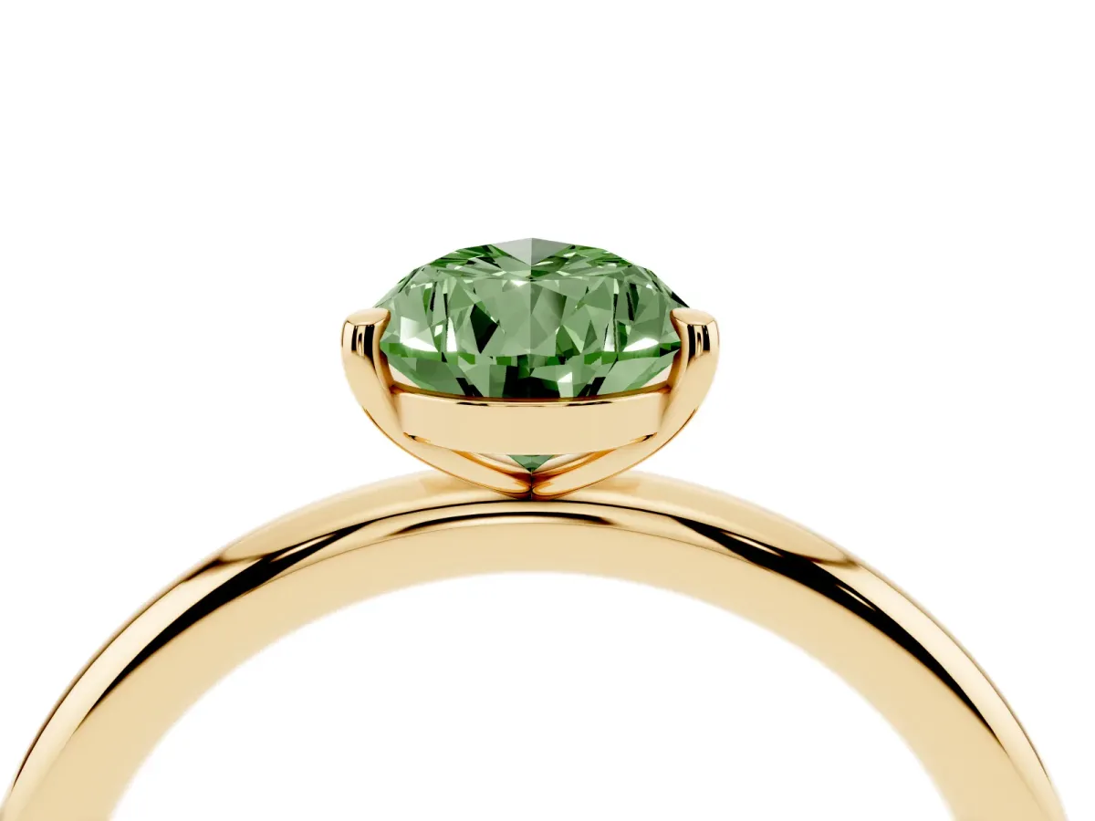 Fancy Green Pear Cut Solitaire Diamond Ring with Four-Prong Setting on a Plain Band Yellow gold