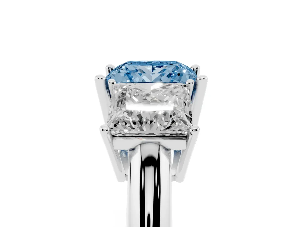 Fancy Blue Three-Stone Princess Cut Cut Diamond Engagement Ring with Prong Setting on a White Gold Band Silver