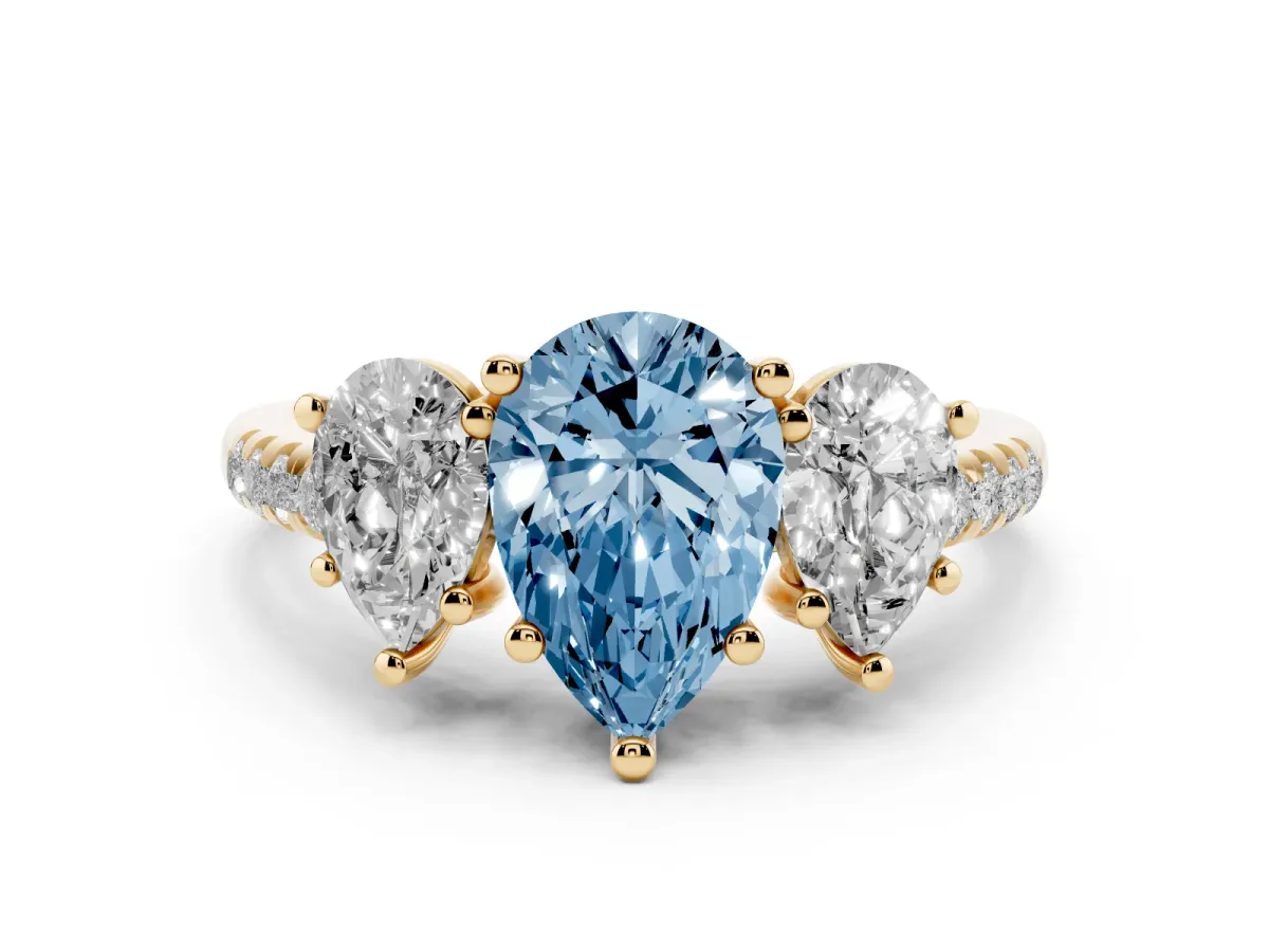 Fancy Blue Three-Stone Pear Cut Diamond Ring with Round Pavé Band and Prong Setting Yellow gold