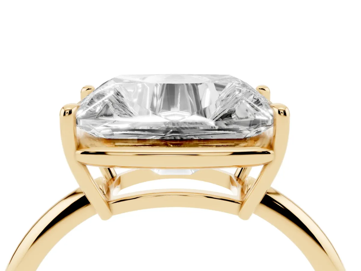 Old Mine Elongated Cushion Diamond East-West Bezel Set Four Claw Solitaire Ring Yellow gold