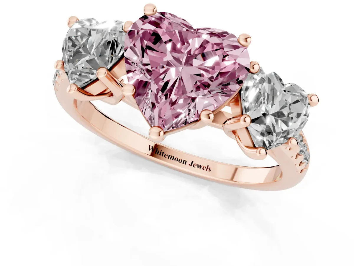 Fancy Pink Three-Stone Heart Cut Diamond Ring with Round Pavé Band and Prong Setting Rose gold