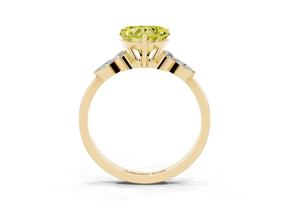 Fancy Yellow Heart Cut Brilliant Diamond Solitaire Ring with Pear Side Stones and Four-Prong Setting Yellow gold