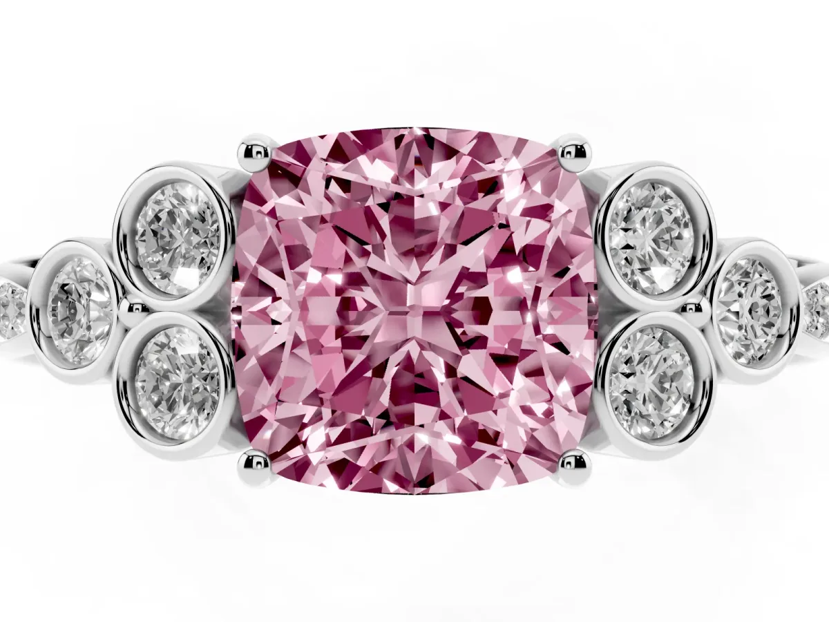 Fancy Pink Cushion Cut Cut Diamond Engagement Ring with Bezel Set Round Side Stones and Prong Setting Platinum