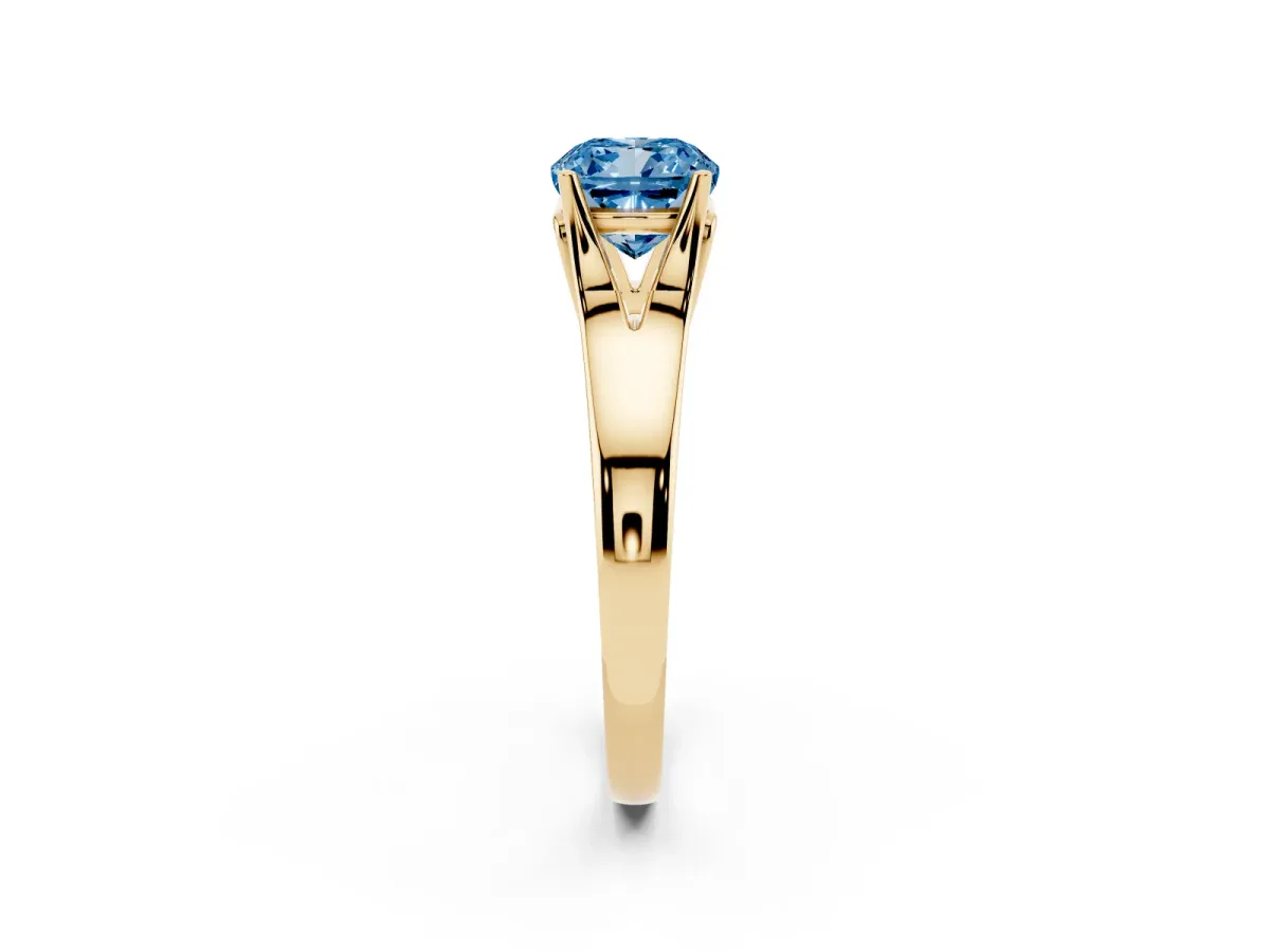 Fancy Blue Cushion Cut Solitaire Diamond Ring with Cathedral Band and Four-Prong Setting Yellow gold