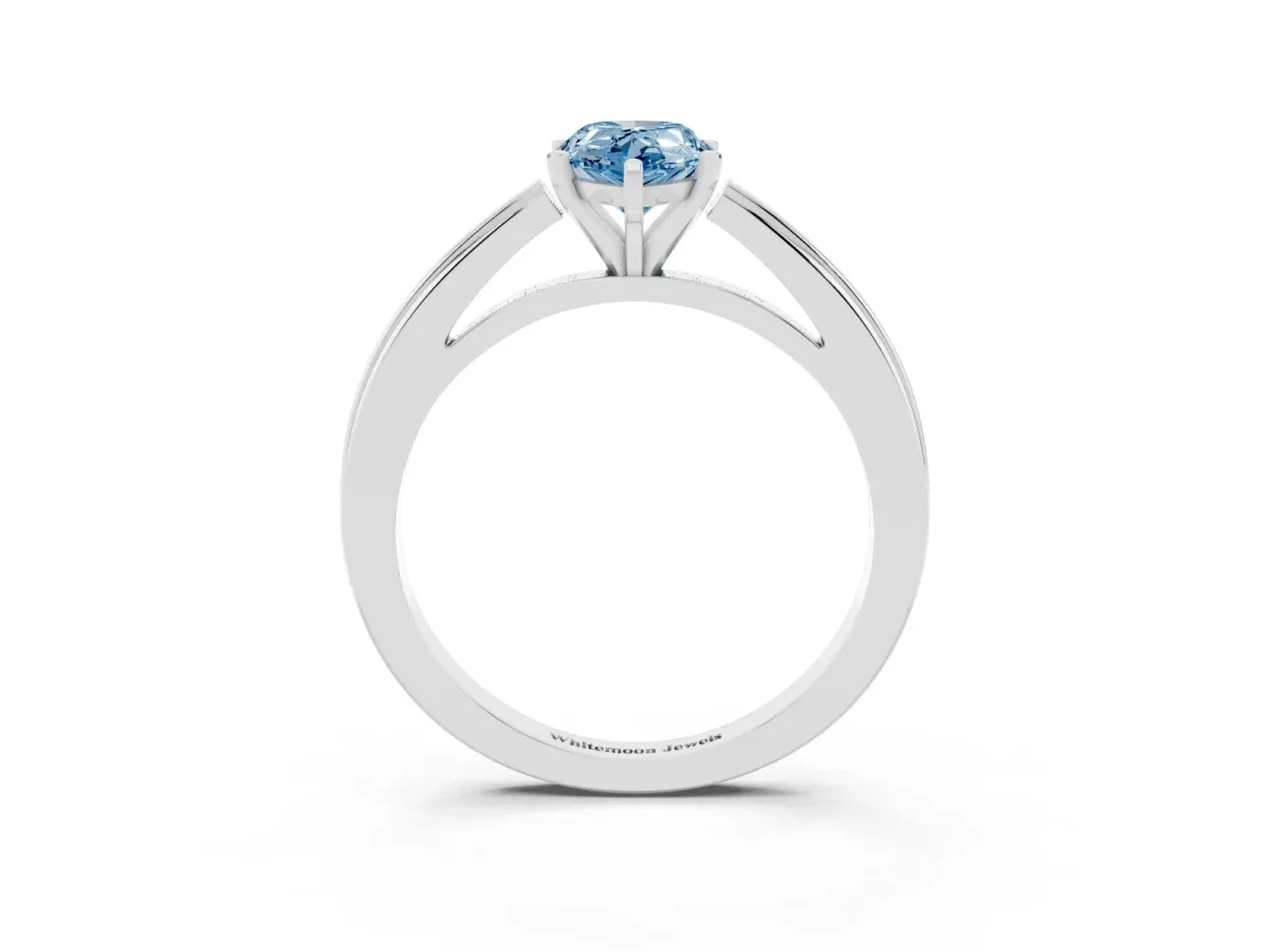 Fancy Blue Pear Cut Solitaire Diamond Ring with Four-Prong Setting and Classic Band White gold