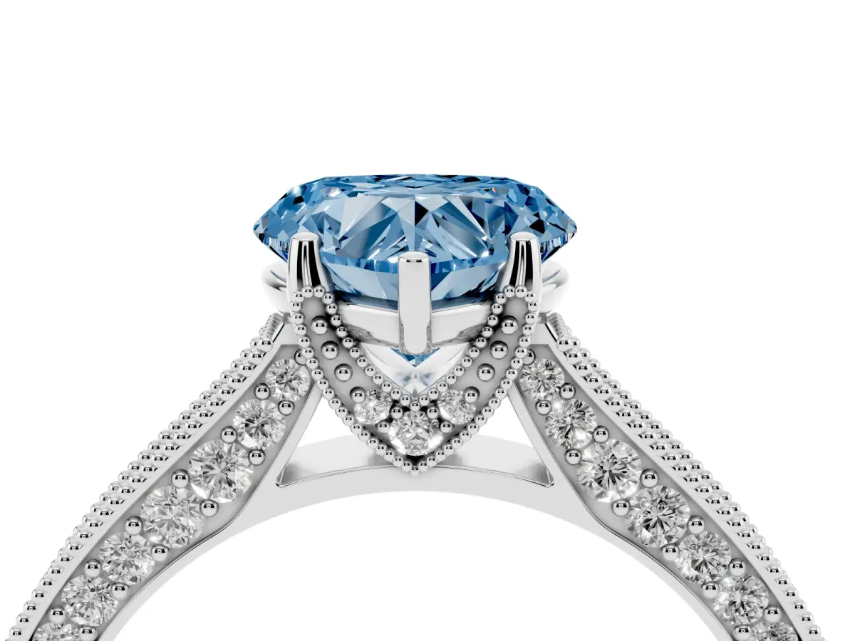 Fancy Blue Heart Cut Cut Diamond Solitaire Ring with Milgrain Pave Band and Four Prong Setting Platinum