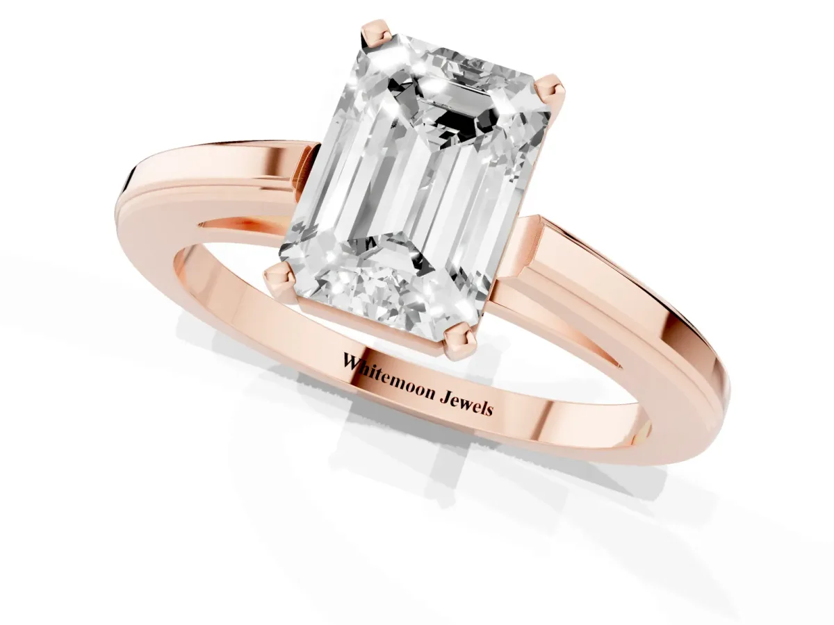 Emerald Cut Solitaire Diamond Ring with Four-Prong Setting and Classic Band Rose gold
