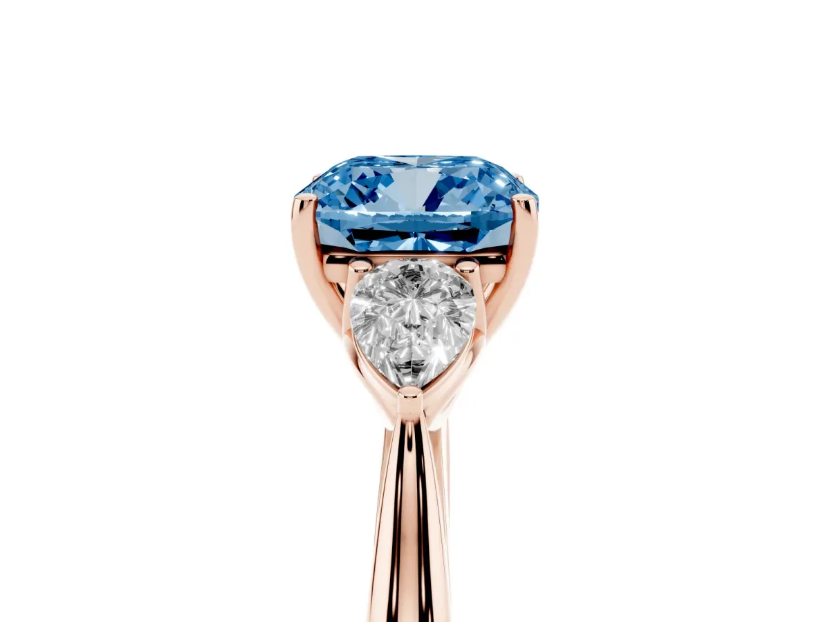 Fancy Blue Cushion Cut Diamond Three-Stone Ring with Pear Side Stones and Prong Setting Rose gold