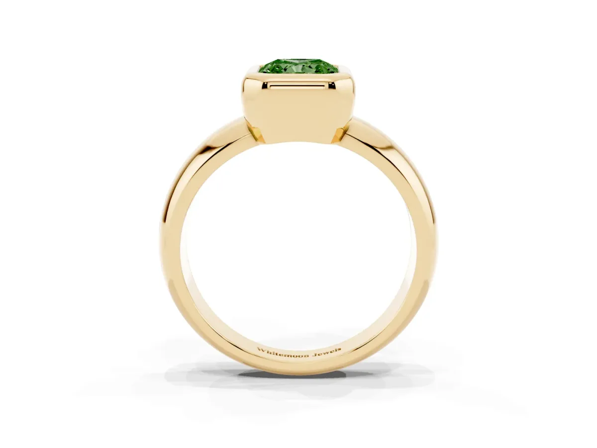 Fancy Green Bezel Set Radiant Cut Solitaire Ring with Wide Band Yellow gold