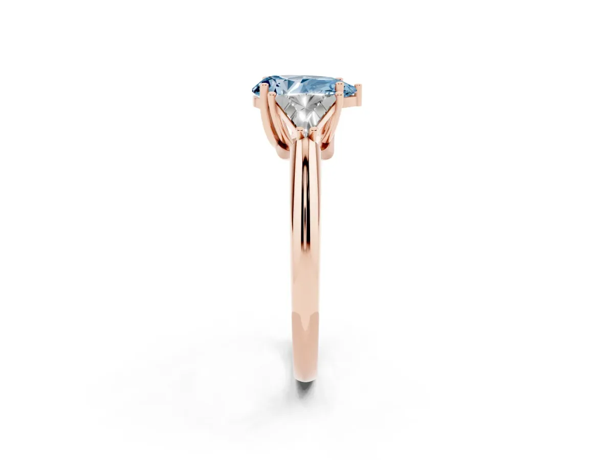 Fancy Blue Three-Stone Pear Cut Diamond Engagement Ring with Trillion Side Stones and Prong Setting Rose gold