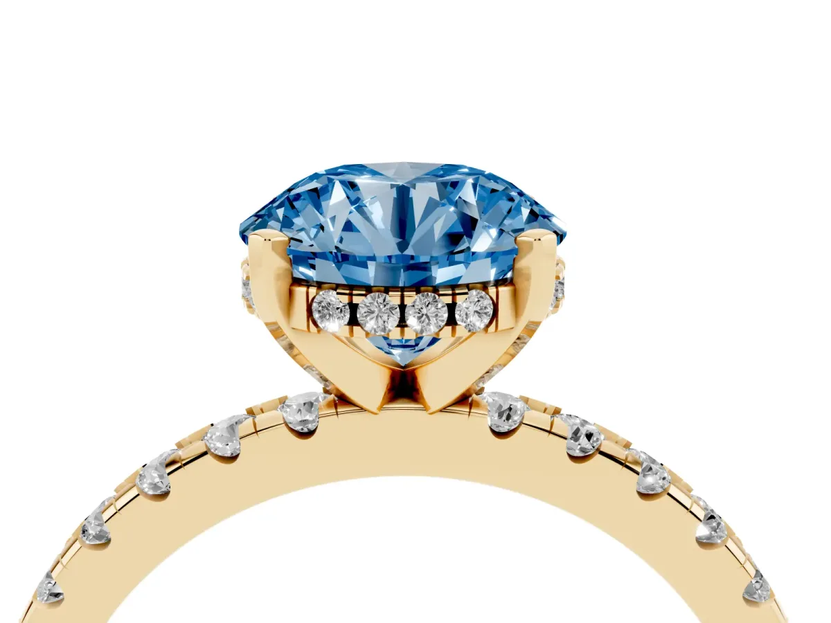 Fancy Blue Round Cut Diamond Solitaire Ring with Round Pavé Band and Four-Prong Setting Yellow gold