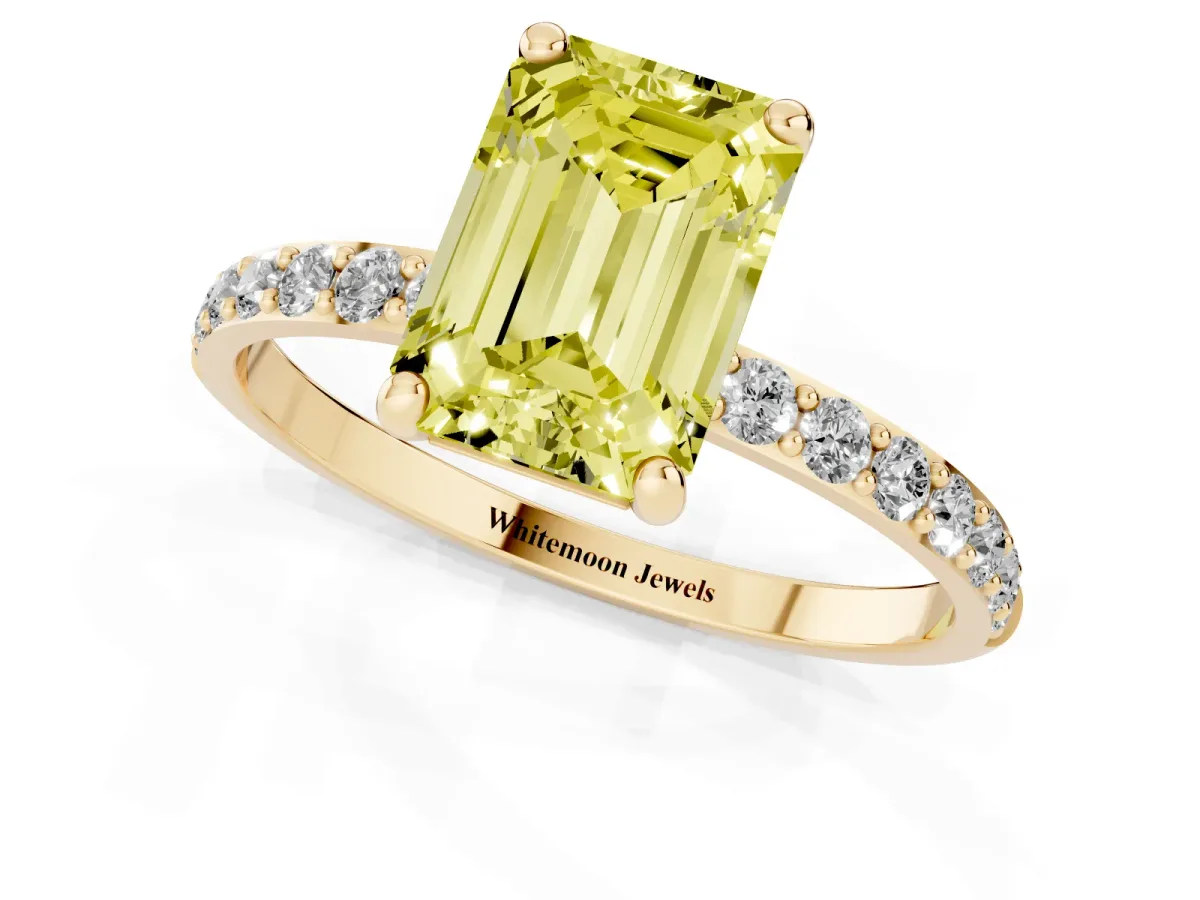 Fancy Yellow Emerald Cut Diamond Solitaire Ring with Round Pavé Band and Prong Setting Yellow gold