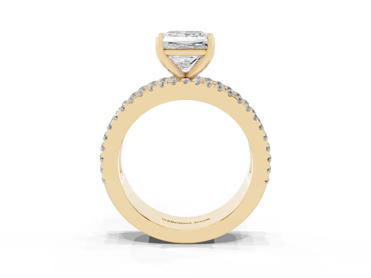 Princess Cut Diamond Solitaire Ring with Pavé and Channel Set Band Yellow gold