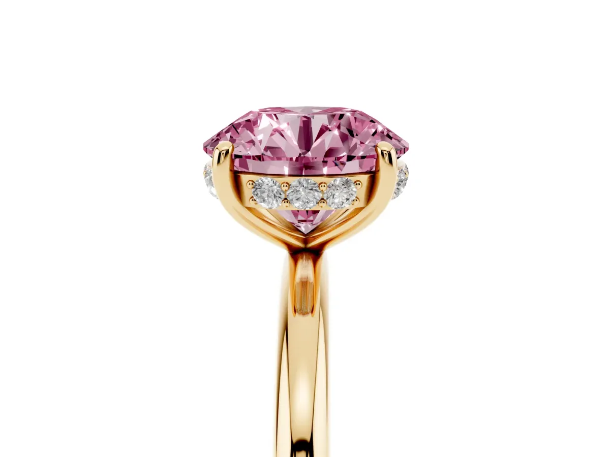 Fancy Pink Round Cut Solitaire Diamond Ring with a Classic Band and Four-Prong Setting Yellow gold