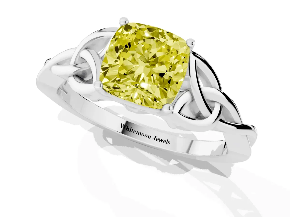 Fancy Yellow Cushion Cut Diamond Solitaire Engagement Ring with Celtic Knot Band and Four-Prong Setting Silver