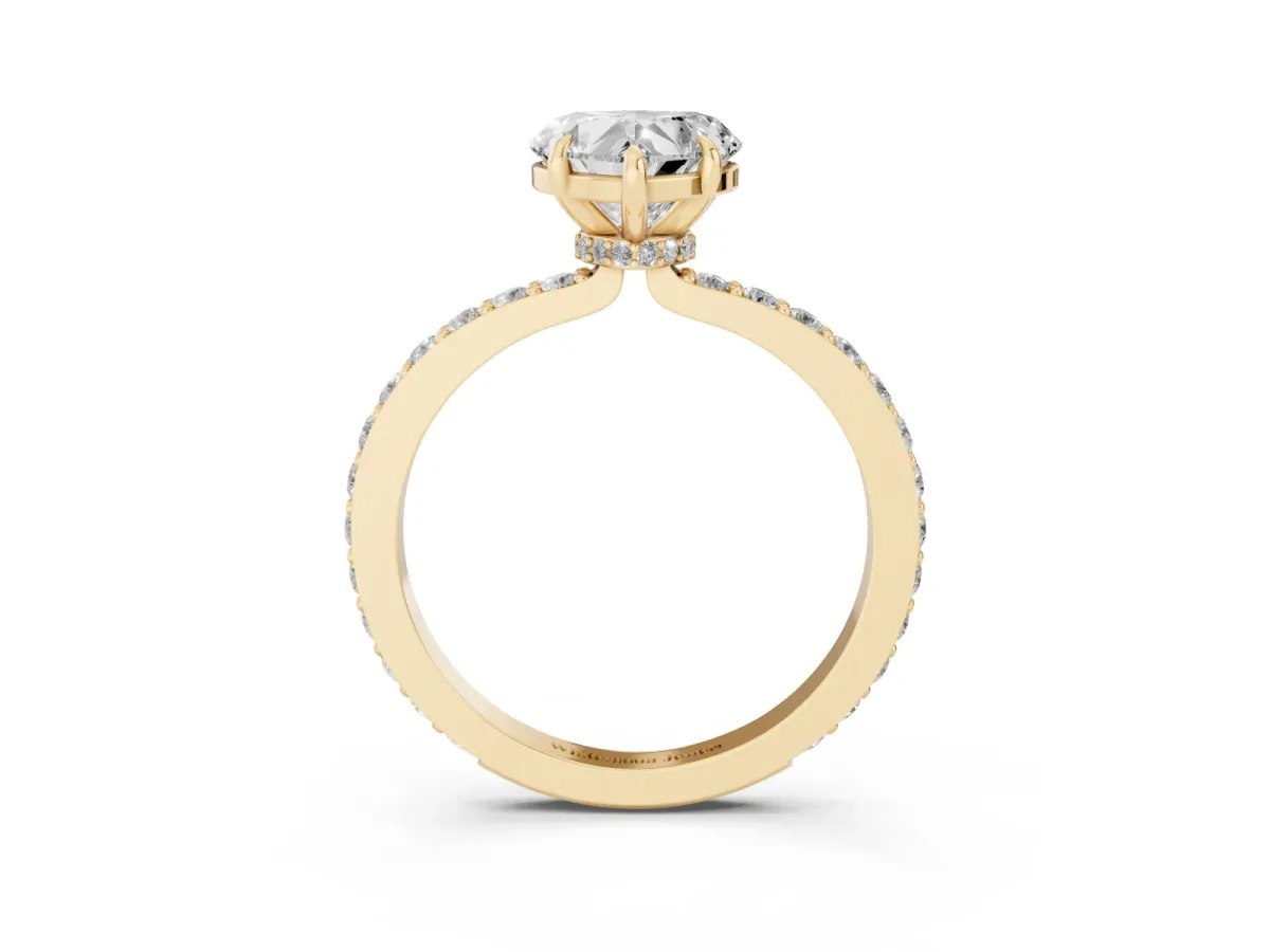 Heart Cut Diamond Pavé Engagement Ring with Round Accents and Prong Setting Yellow gold