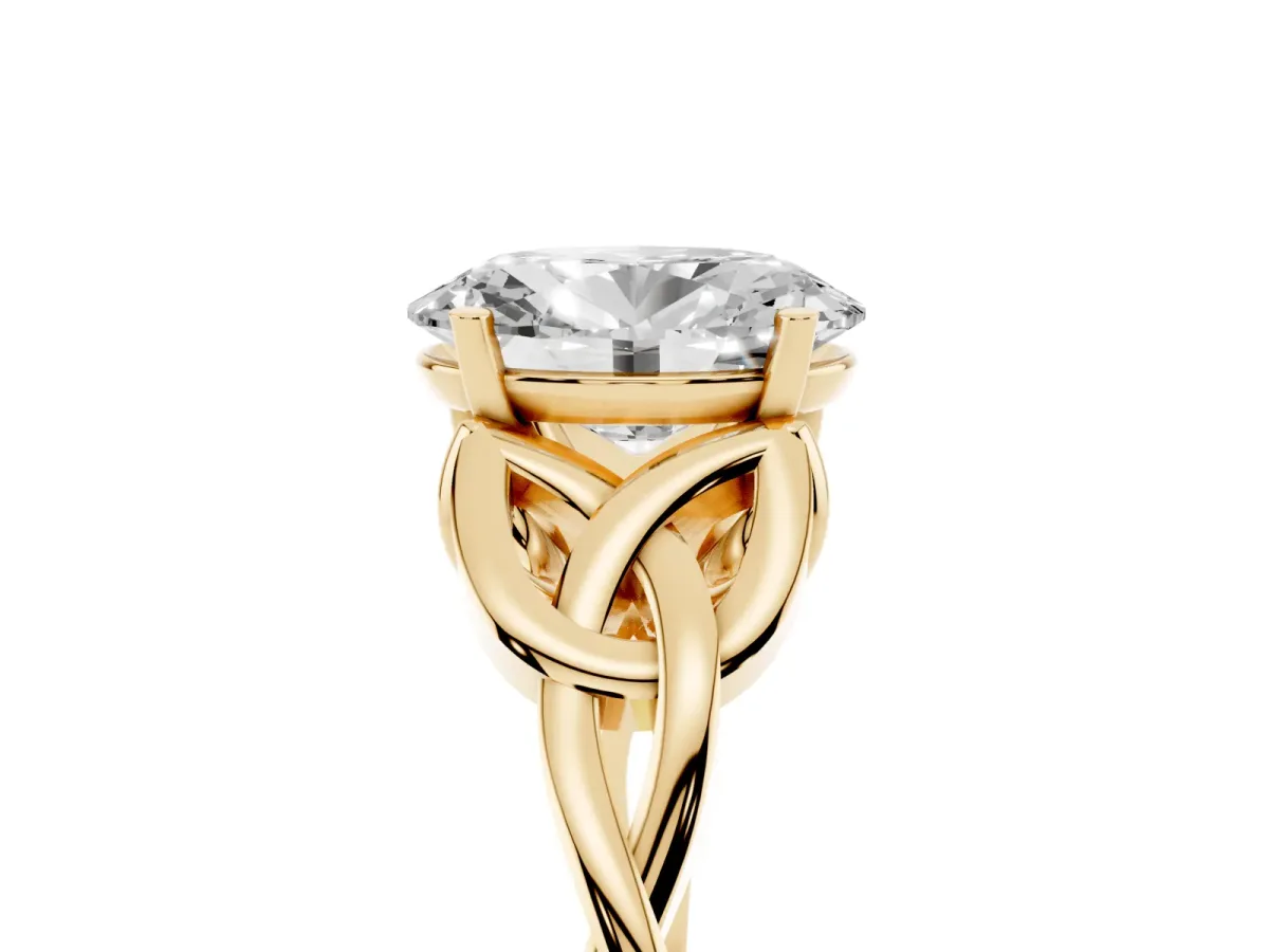 Oval Cut Diamond Solitaire Engagement Ring with Celtic Knot Band and Four-Prong Setting Yellow gold