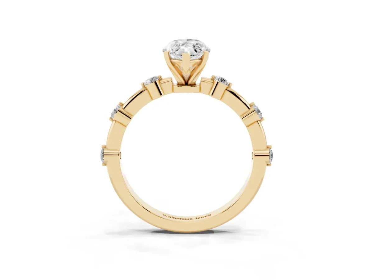 Marquise Cut Solitaire Diamond Ring with Bezel Set Side Stones and Prong Setting Yellow gold