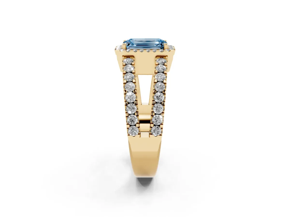Fancy Blue Emerald Cut Cut Halo Split Shank Diamond Ring with Four-Prong Setting Yellow gold