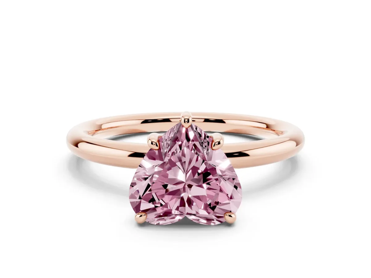 Fancy Pink Heart Cut Solitaire Diamond Ring with Four-Prong Setting on a Plain Band Rose gold