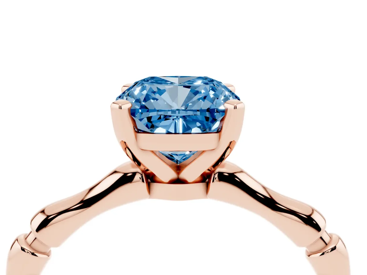 Fancy Blue Cushion Cut Solitaire Diamond Ring with Bamboo Band and Four-Prong Setting Rose gold