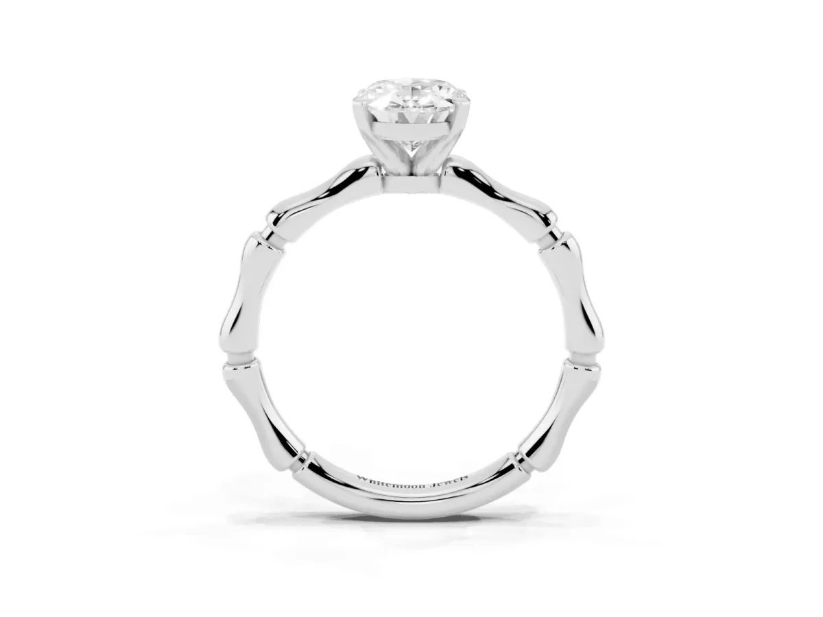 Oval Cut Solitaire Diamond Ring with Bamboo Band and Four-Prong Setting Silver