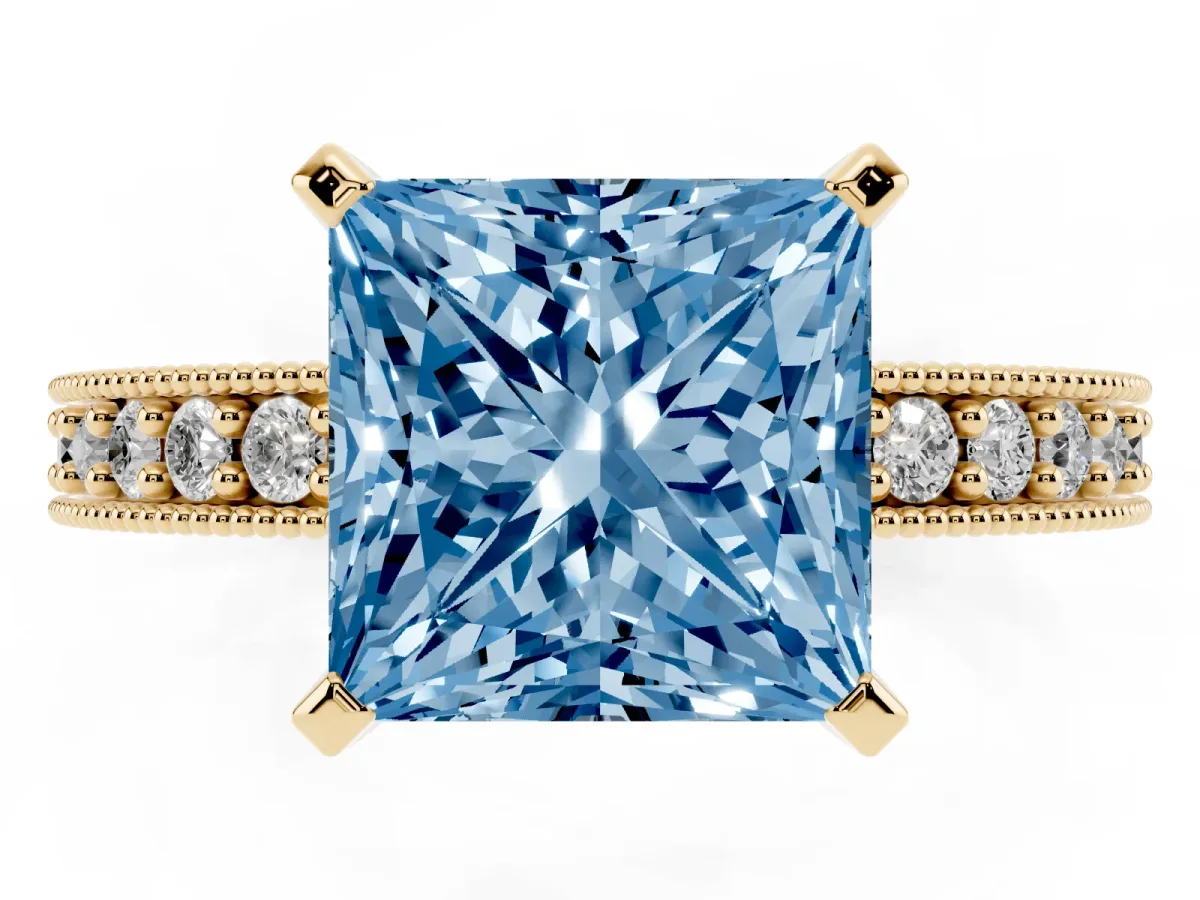 Fancy Blue Princess Cut Diamond Milgrain Pavé Engagement Ring with Four-Prong Setting Yellow gold