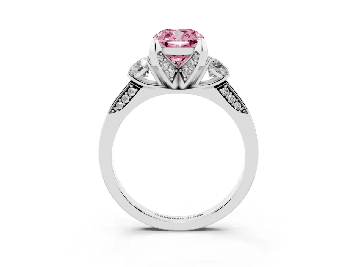Fancy Pink Cushion Cut Brilliant Three-Stone Diamond Ring with Pavé Band and Four-Prong Setting Platinum
