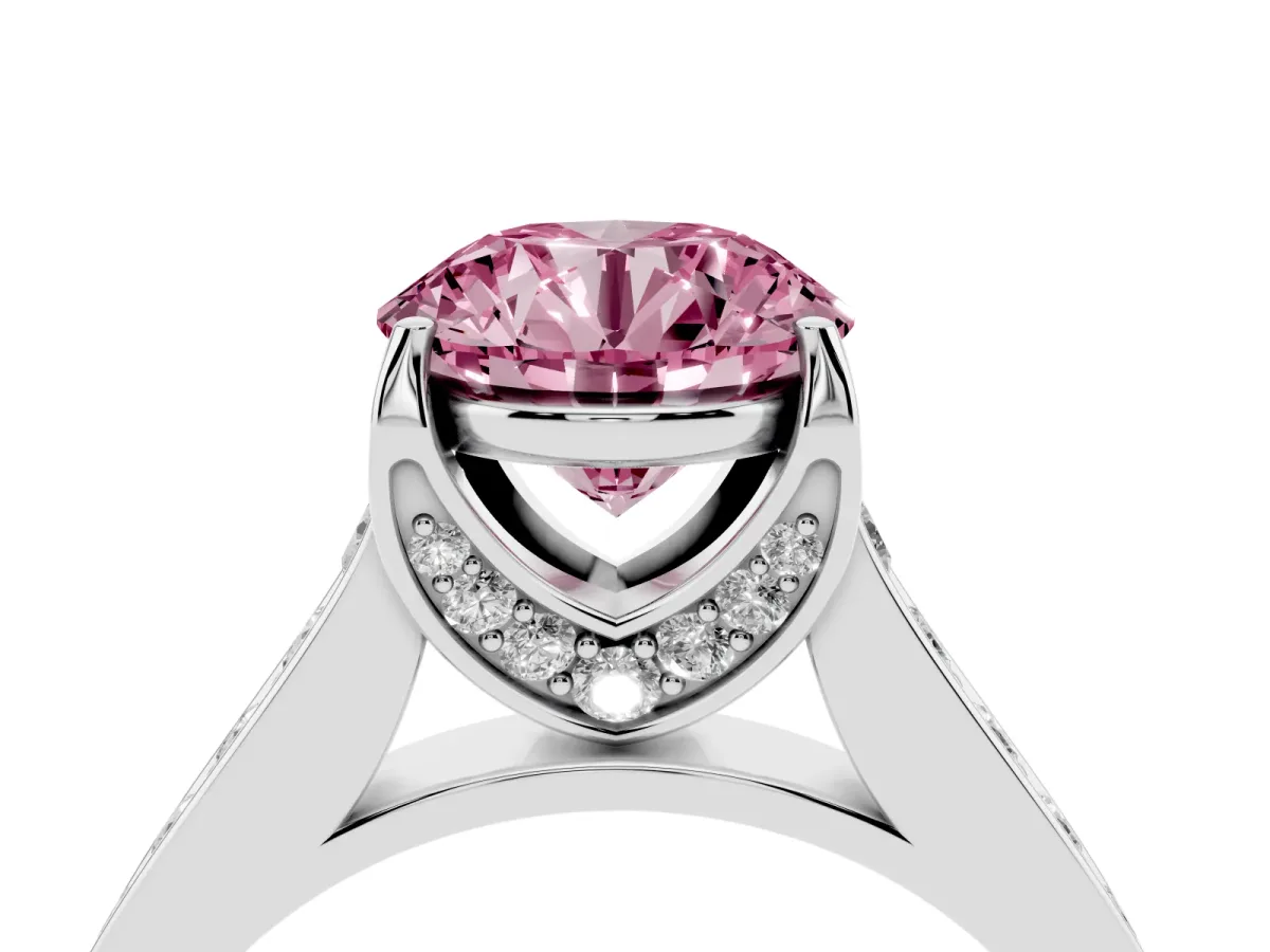 Fancy Pink Round Cut Brilliant Cut Diamond Engagement Ring with Pavé Band and Four-Prong Setting Silver