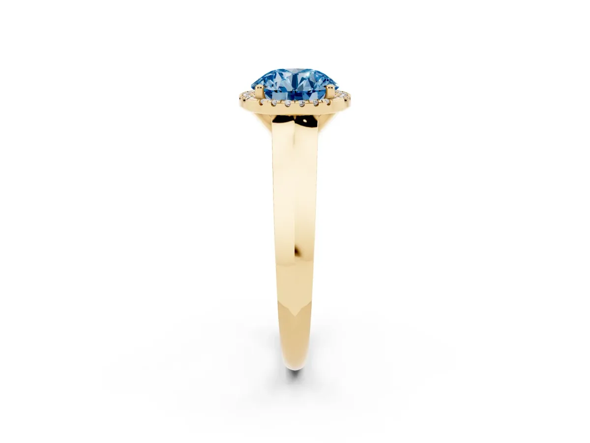Fancy Blue Round Cut Halo Diamond Ring with Cathedral Band and Four-Prong Setting Yellow gold