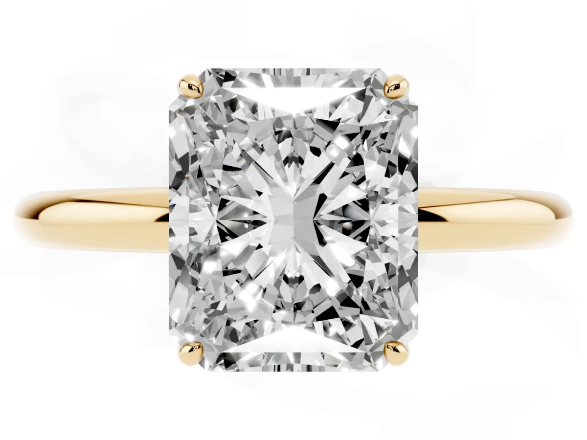 Radiant Cut Solitaire Diamond Ring with Four-Prong Setting on a Plain Band Yellow gold