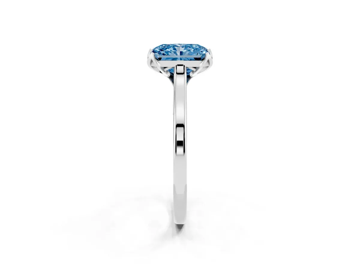 Fancy Blue Radiant Cut Diamond Solitaire Ring with Flower Prong Setting and Classic Band Silver