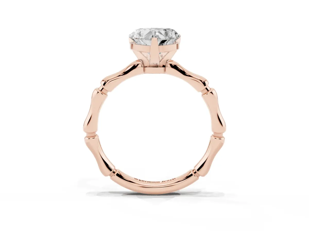 Heart Cut Solitaire Diamond Ring with Bamboo Band and Four-Prong Setting Rose gold