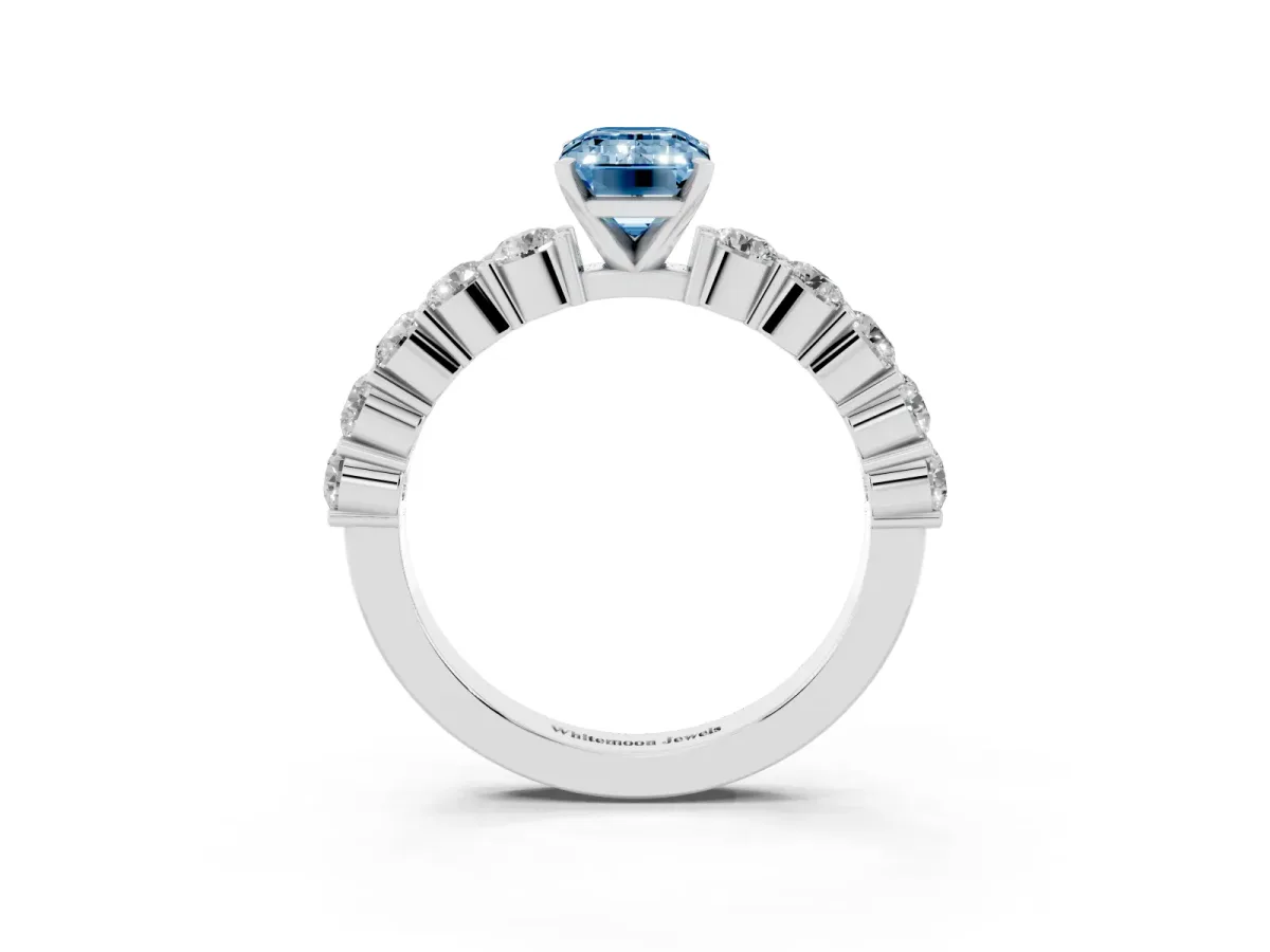 Fancy Blue Emerald Cut Diamond Solitaire Ring with Shared Prong Round Side Stones Platinum