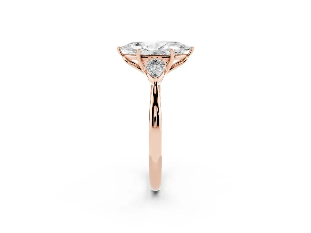 Marquise Cut Diamond Three-Stone Ring with Pear Side Stones and Prong Setting Rose gold