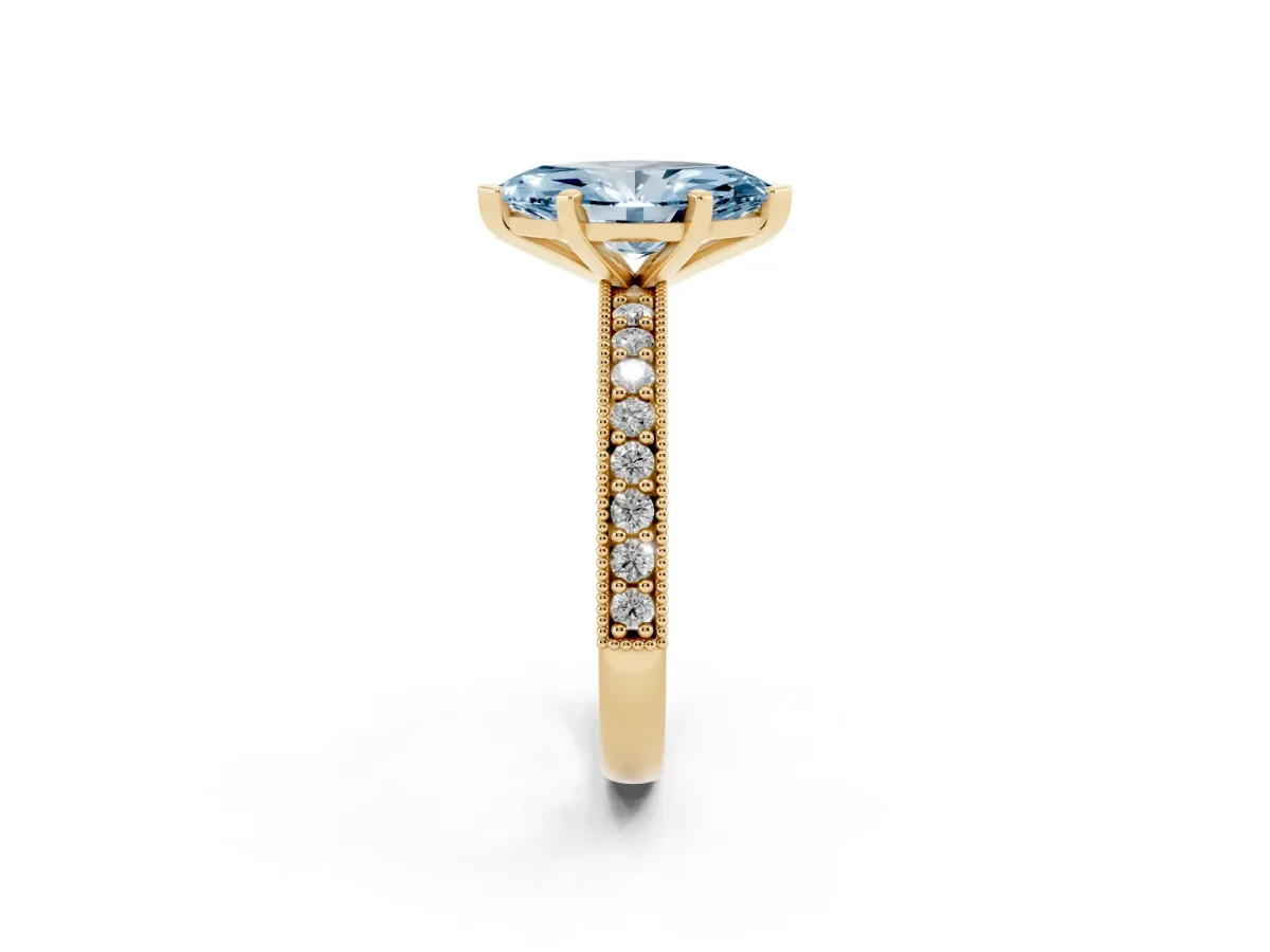 Fancy Blue Marquise Cut Diamond Milgrain Pavé Engagement Ring with Four-Prong Setting Yellow gold