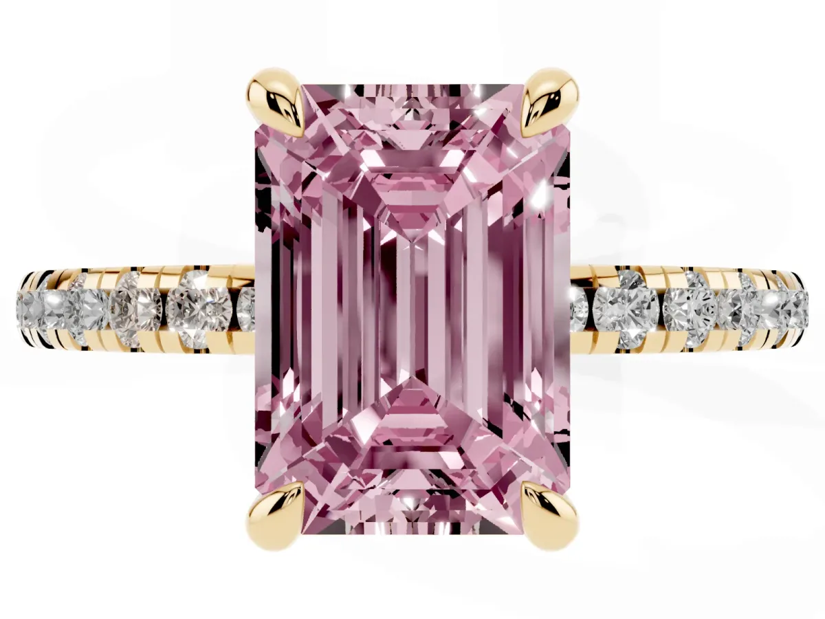 Fancy Pink Emerald Cut Diamond Brilliant Solitaire Ring with Pavé Band and Four-Prong Setting Yellow gold