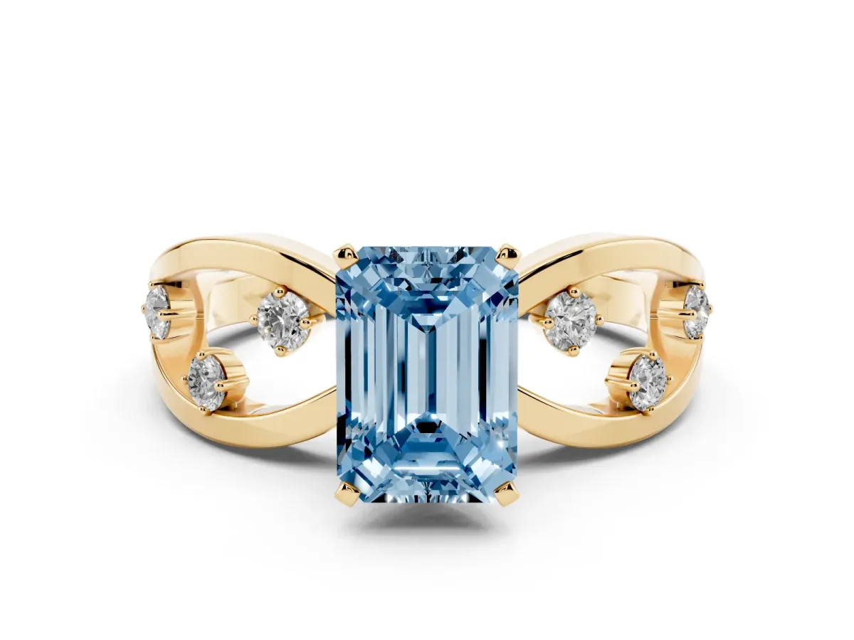 Fancy Blue Emerald Cut Cut Solitaire Diamond with Side Stones on Criss-Cross Band and Four-Prong Setting Yellow gold