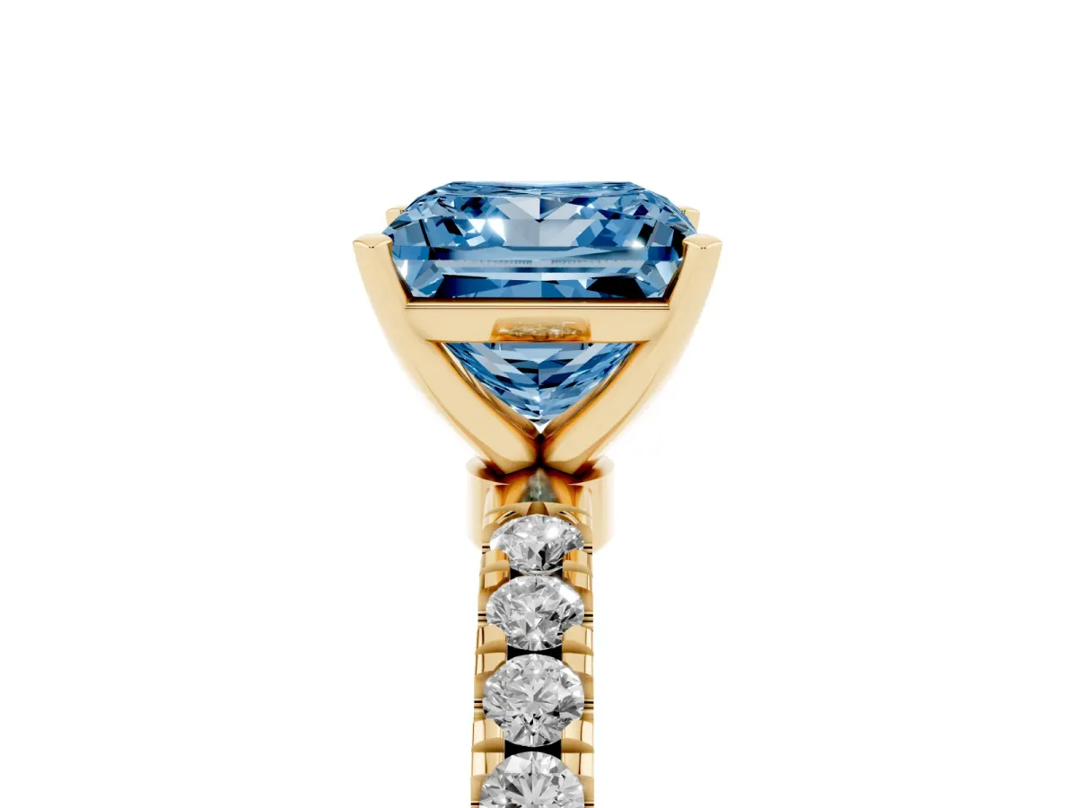 Fancy Blue Princess Cut Diamond Solitaire Ring with Pavé Accents and Four-Prong Setting Yellow gold