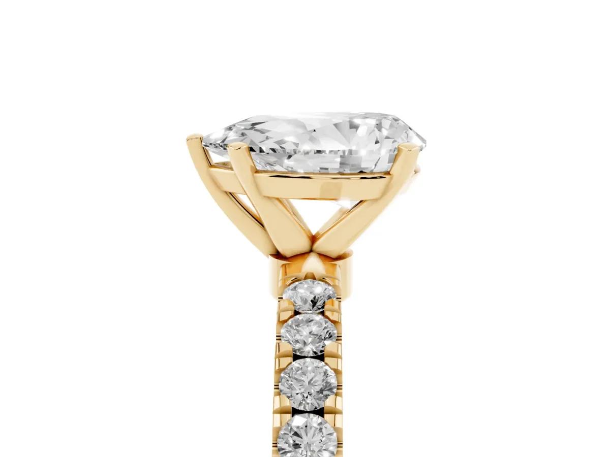 Pear Cut Diamond Solitaire Ring with Pavé Accents and Four-Prong Setting Yellow gold