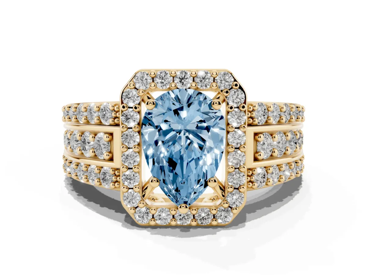 Fancy Blue Pear Cut Halo Diamond Ring with Round Split Shank and Prong Setting Yellow gold