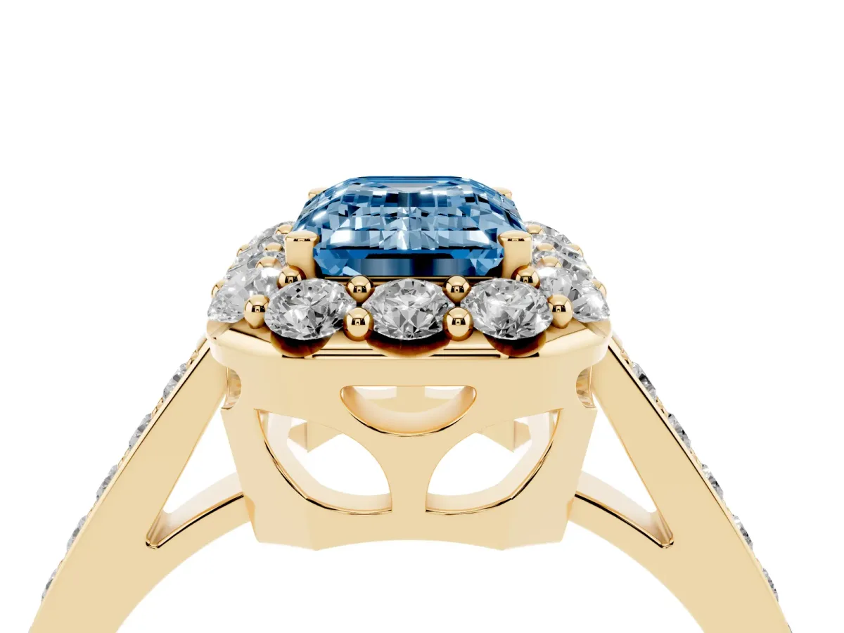 Fancy Blue Emerald Cut Diamond Floral Halo Ring with Pavé Band and Prong Setting Yellow gold