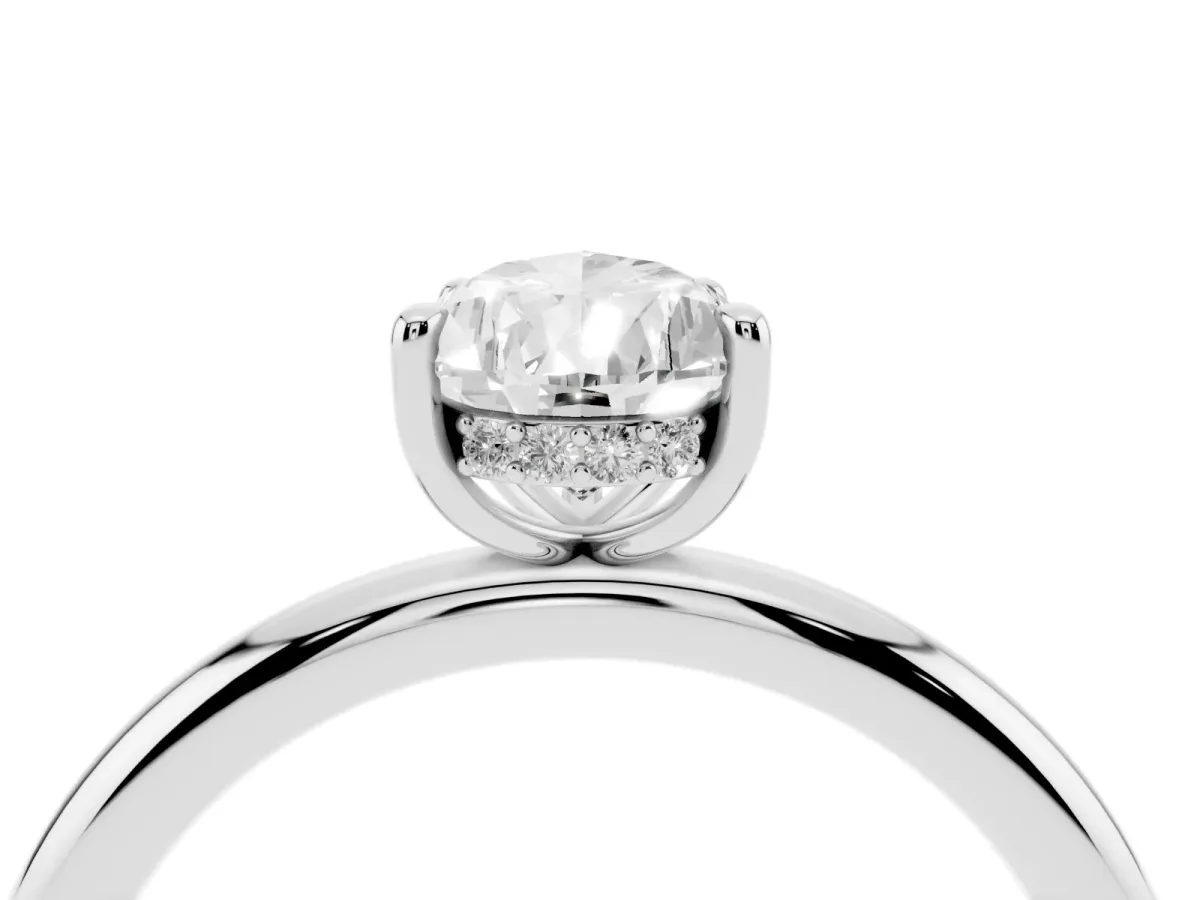 Pear Cut Diamond Solitaire Ring with Thin Band and Four-Prong Setting Silver