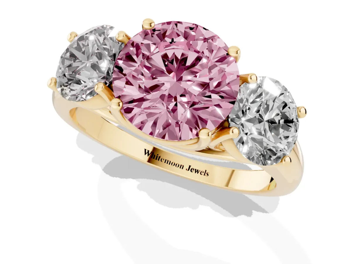 Fancy Pink Three-Stone Round Cut Diamond Engagement Ring with Prong Setting Yellow gold