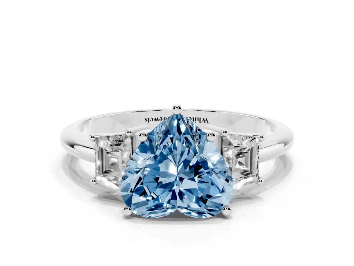 Fancy Blue Heart Cut Diamond Three-Stone Ring with Trapezoid Side Stones and Prong Setting Silver