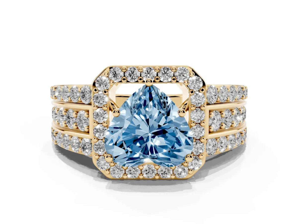 Fancy Blue Heart Cut Halo Diamond Ring with Round Split Shank and Prong Setting Yellow gold