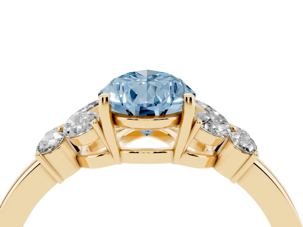 Fancy Blue Pear Cut Cut Solitaire Floral Diamond Ring with Four-Prong Setting Yellow gold
