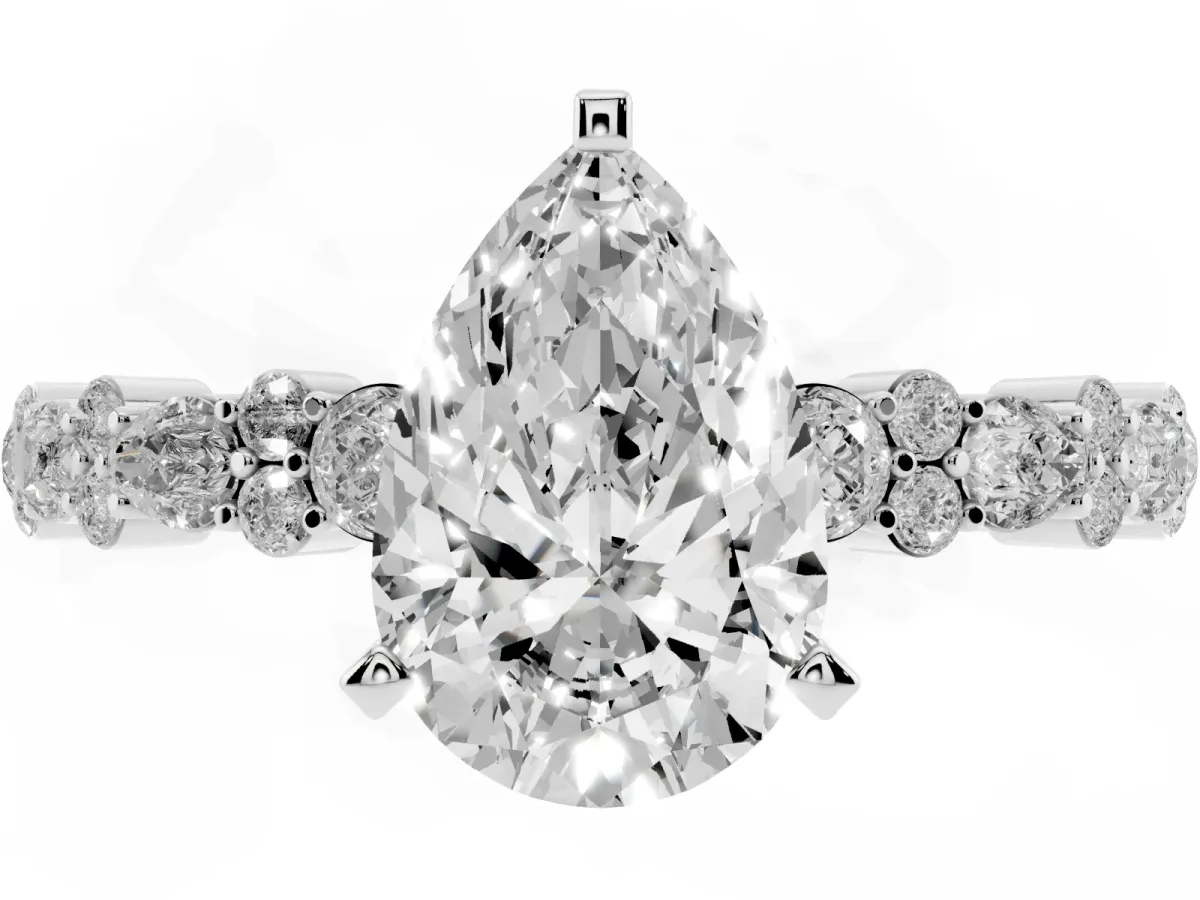 Pear Cut Diamond Side Stone Solitaire Ring with Round and Four-Prong Setting Silver
