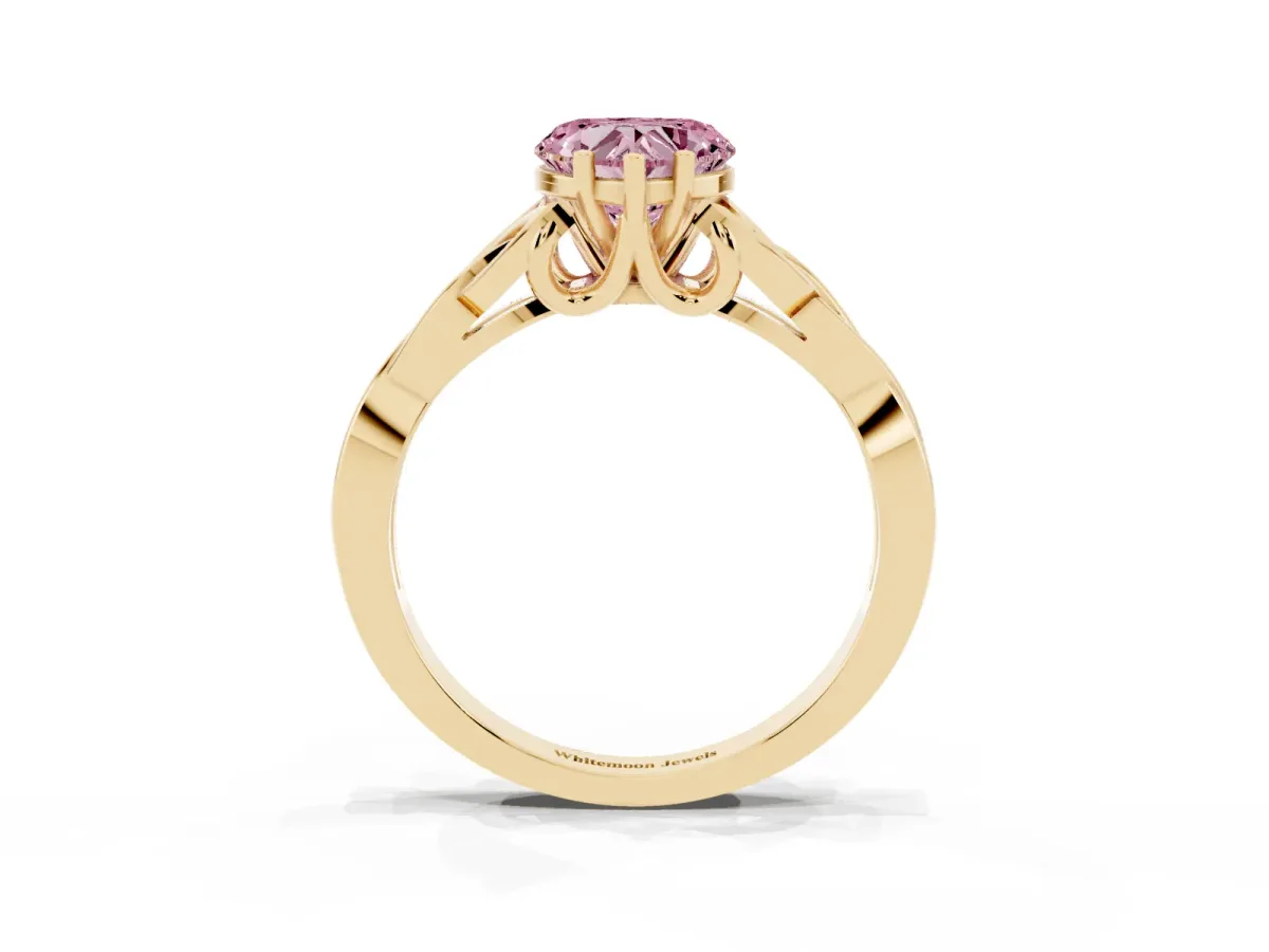 Fancy Pink Heart Cut Diamond Solitaire Engagement Ring with Celtic Knot Band and Four-Prong Setting Yellow gold