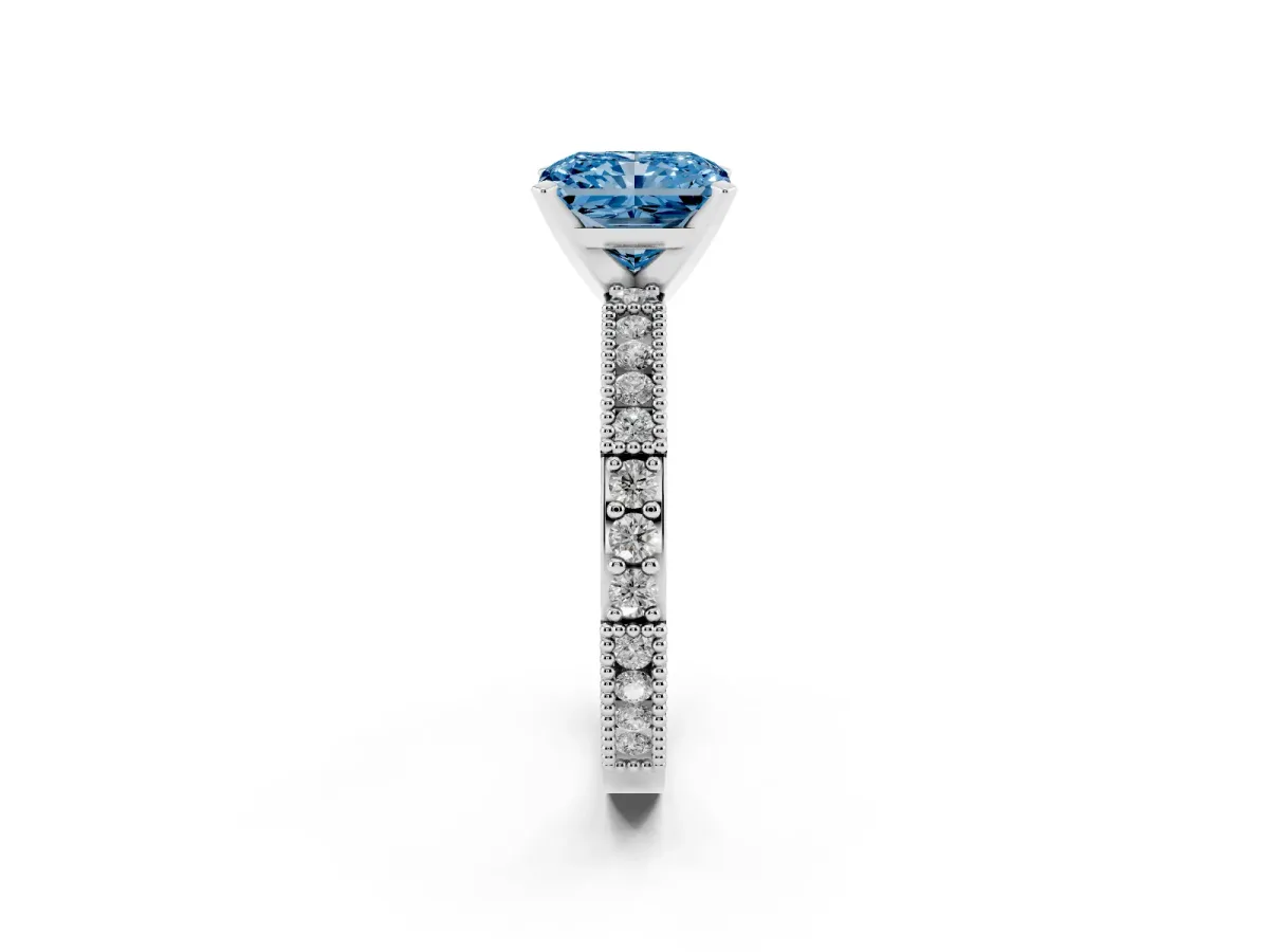 Fancy Blue Radiant Cut Solitaire with Pavé Band and Four-Prong Setting Silver